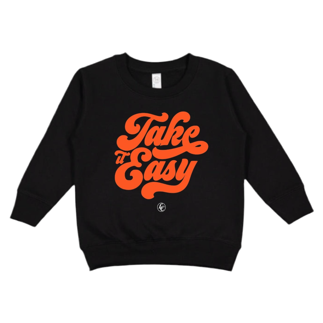 Black sweatshirt with orange 'Take It Easy' text on a white background