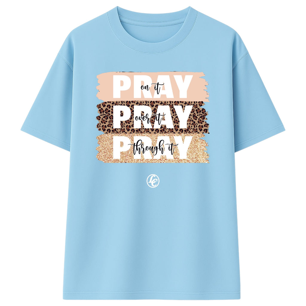 Light blue t-shirt with 'PRAY' text design on a white background