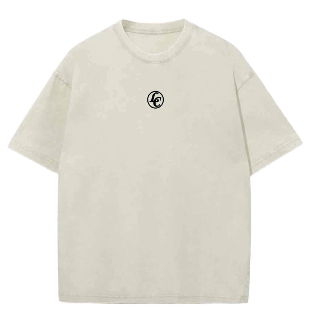 Beige t-shirt with a small logo on a white background