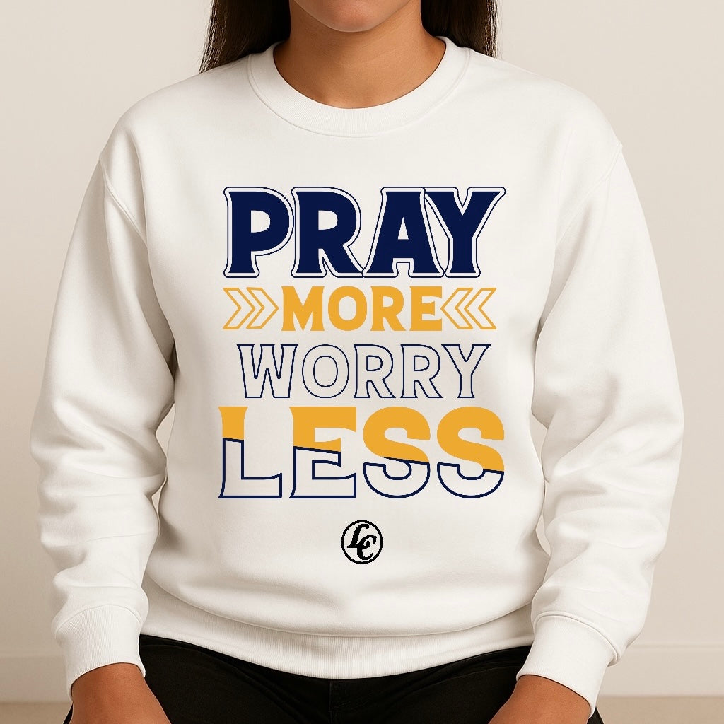 White sweatshirt with 'PRAY MORE WORRY LESS' text on a plain background
