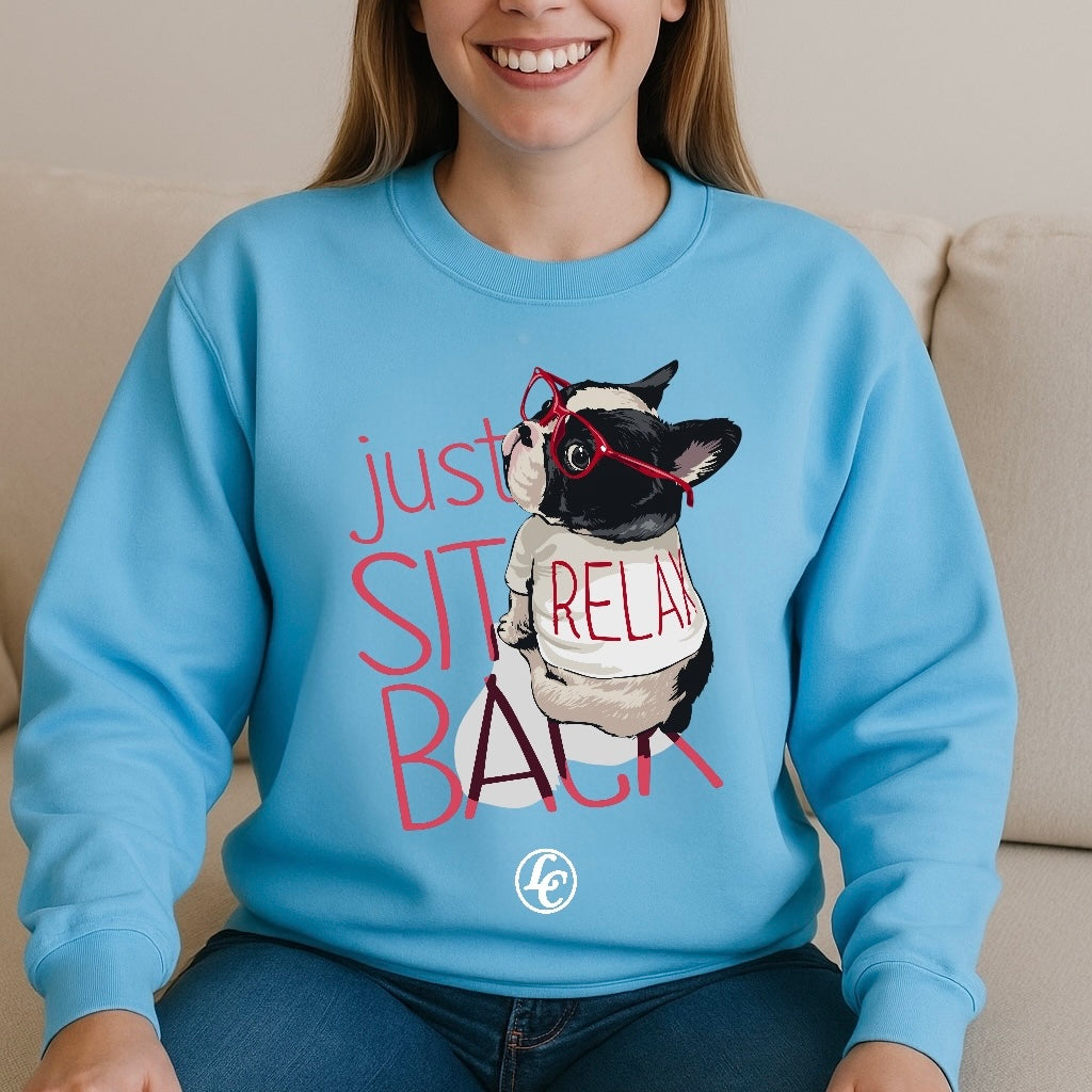 Person wearing a blue sweatshirt with a dog graphic and text
