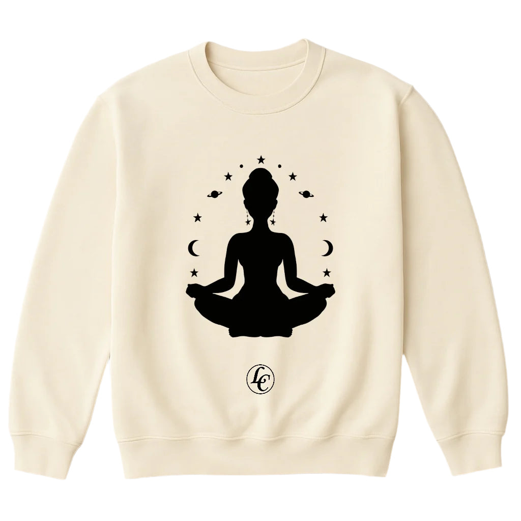 Beige sweatshirt with a black silhouette of a person in a meditative pose on a light gray background