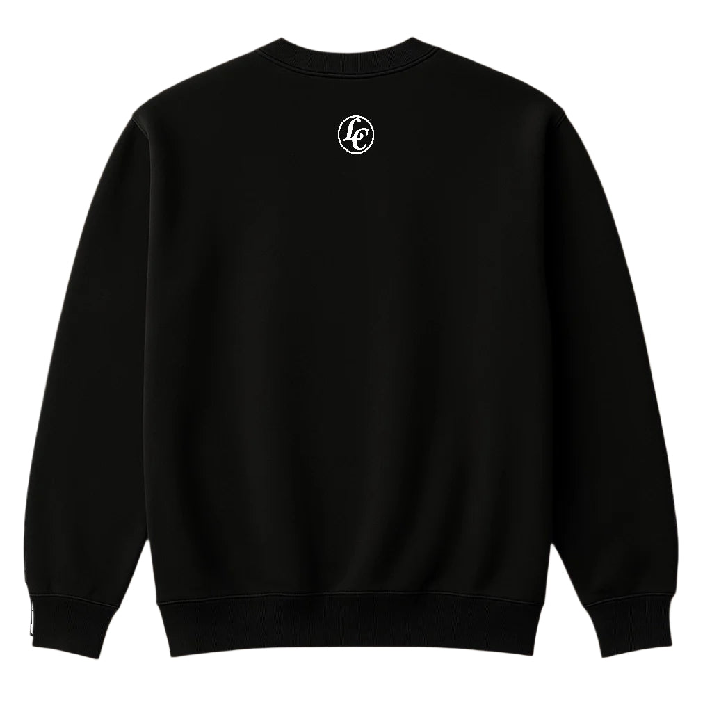 Black sweatshirt with a logo on the back against a beige background