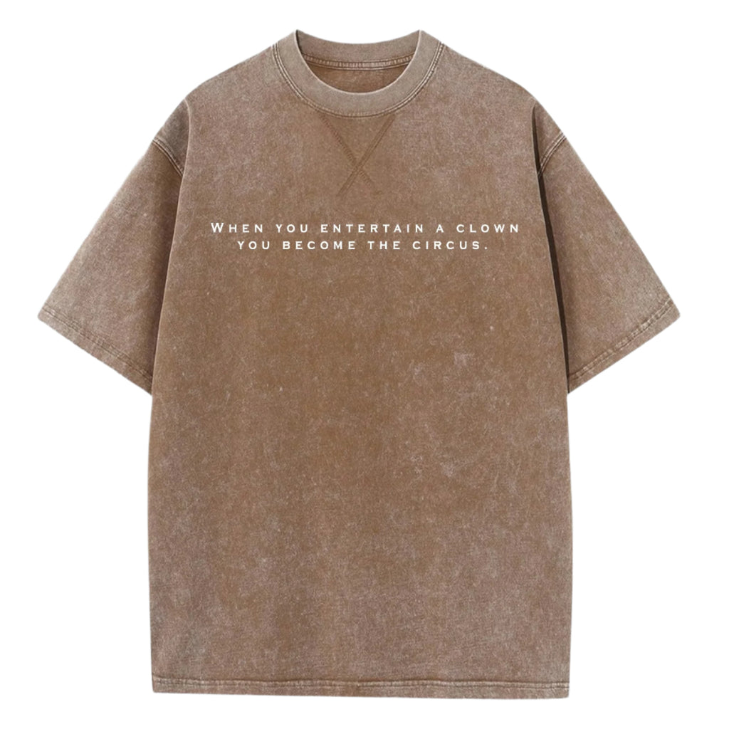 Vintage Brown oversized t-shirt with white text on a white background
