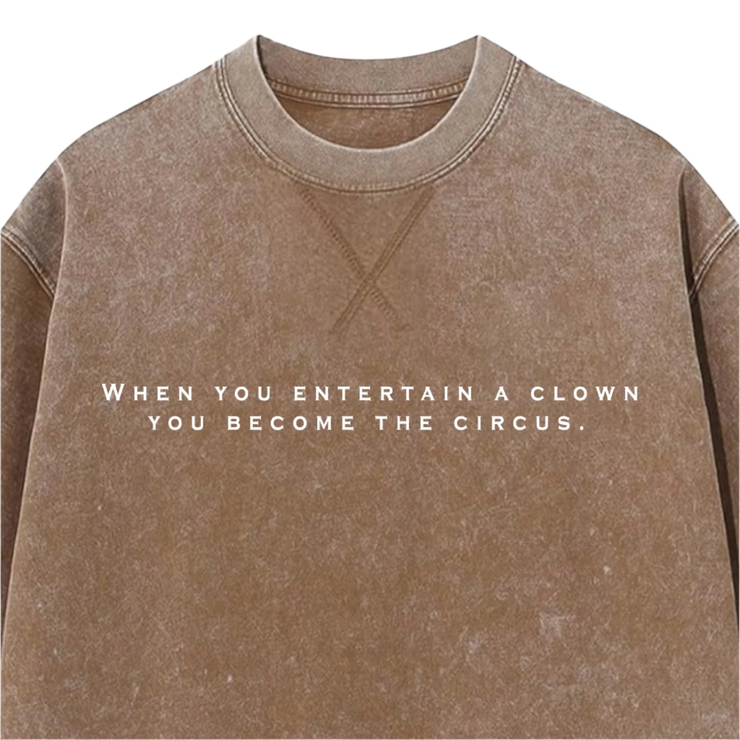 Vintage Brown Oversized tshirt with text 'When you entertain a clown you become the circus' on a white background