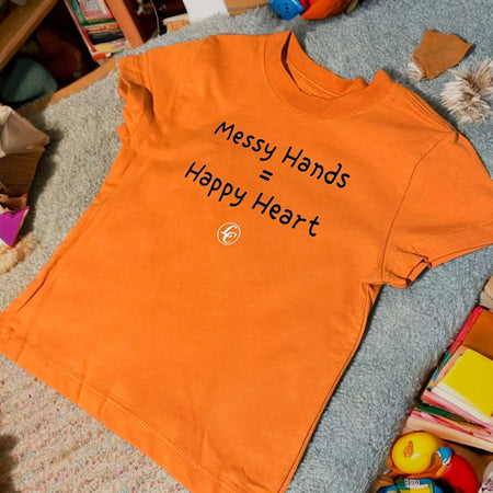 Orange Messy Hands Happy Heart Baby/Toddler Tee - motivational streetwear apparel by Lamir Collection