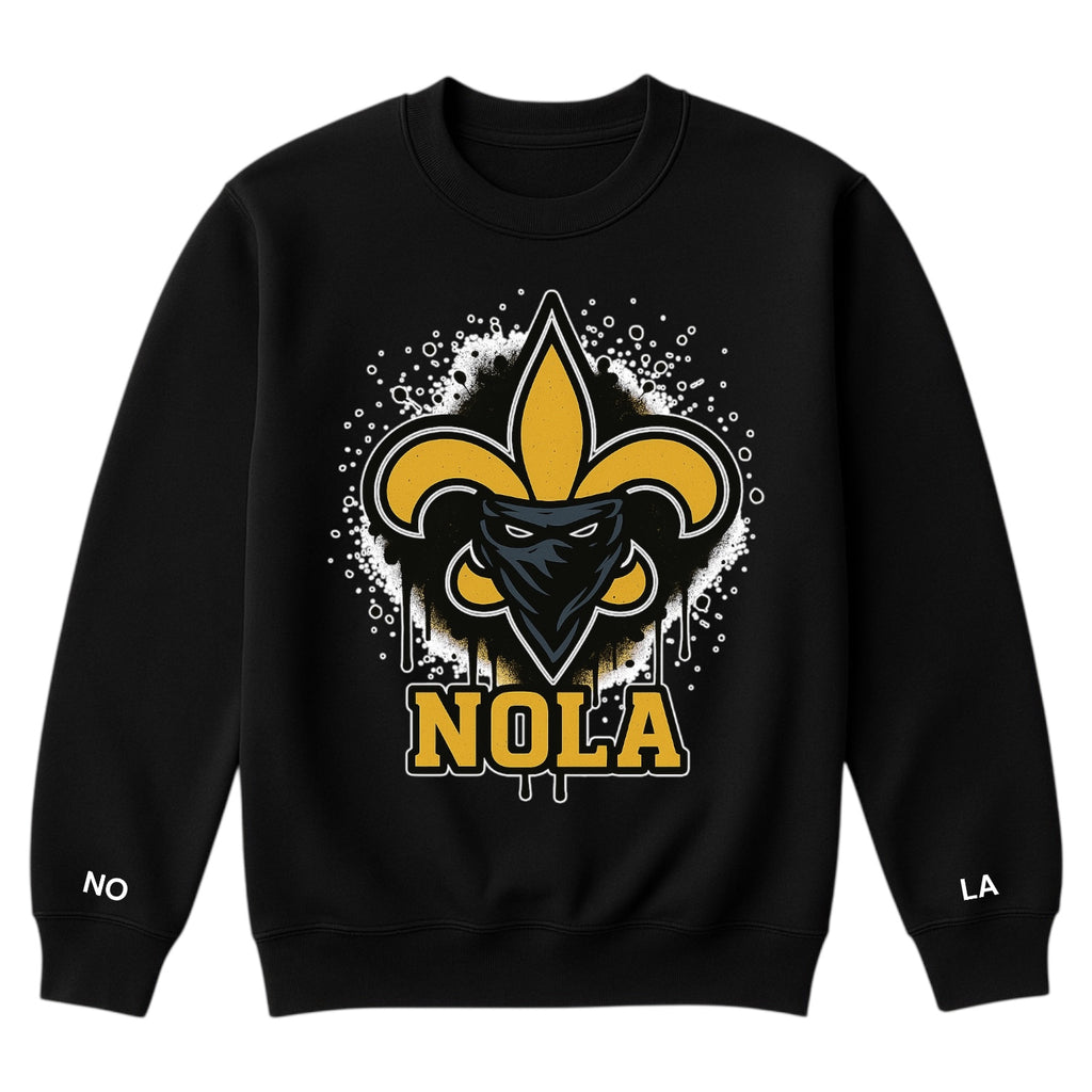 Black sweatshirt with a graphic design featuring a fleur-de-lis and a mask, with 'NOLA' text on a white background.